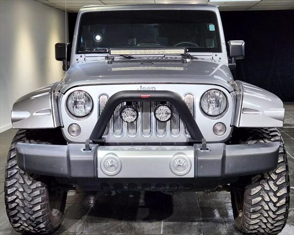 used 2015 Jeep Wrangler Unlimited car, priced at $27,900