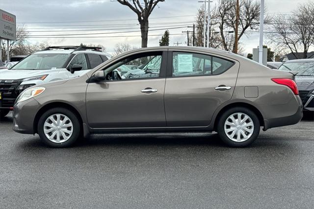 used 2012 Nissan Versa car, priced at $5,500