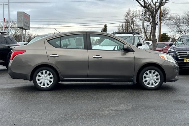 used 2012 Nissan Versa car, priced at $5,500