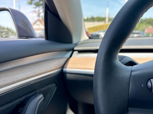 used 2023 Tesla Model 3 car, priced at $24,995