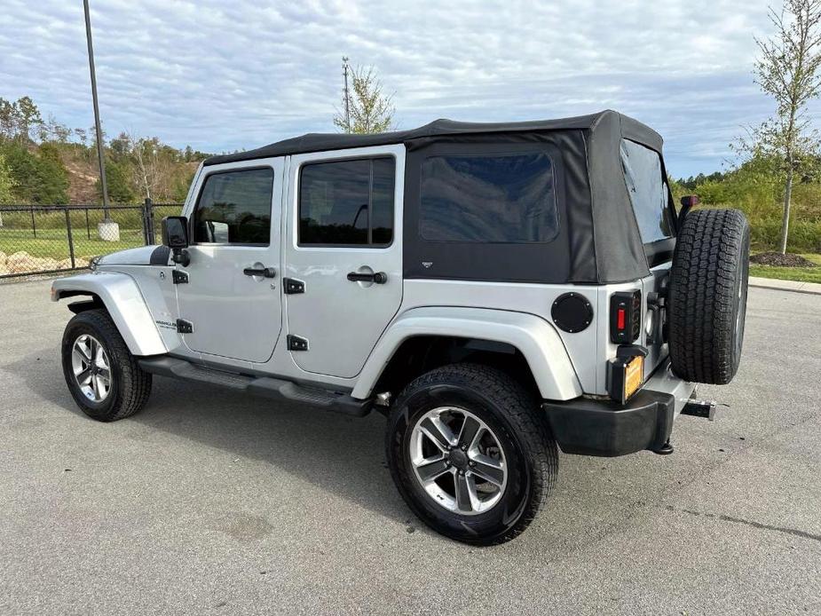 used 2012 Jeep Wrangler Unlimited car, priced at $16,977