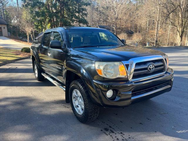 used 2009 Toyota Tacoma car, priced at $11,990