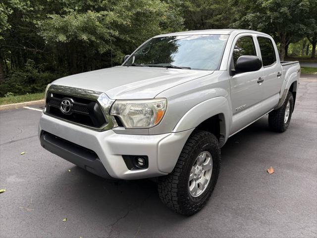 used 2013 Toyota Tacoma car, priced at $13,990