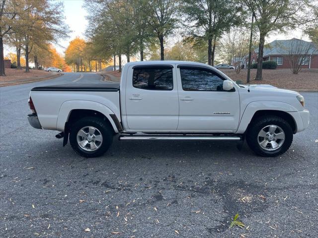 used 2011 Toyota Tacoma car, priced at $14,990