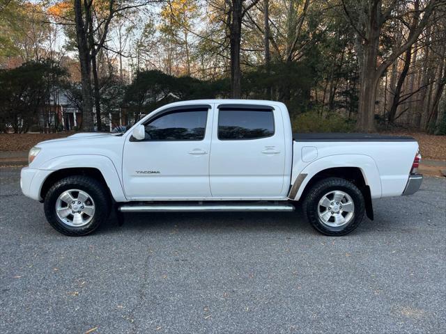 used 2011 Toyota Tacoma car, priced at $14,990