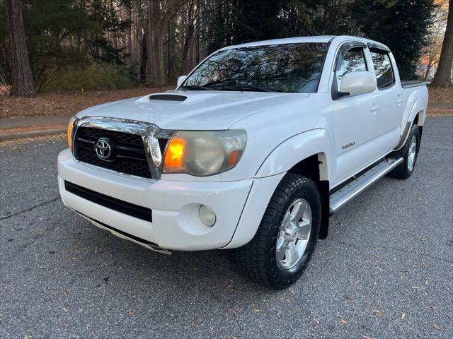 used 2011 Toyota Tacoma car, priced at $14,990