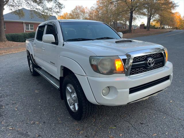 used 2011 Toyota Tacoma car, priced at $14,990