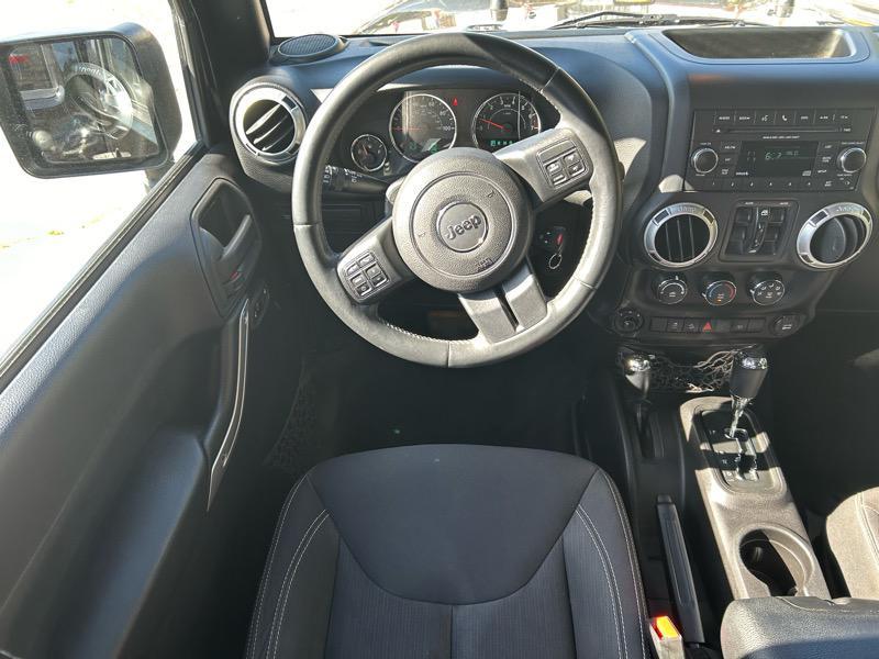 used 2015 Jeep Wrangler Unlimited car, priced at $16,995