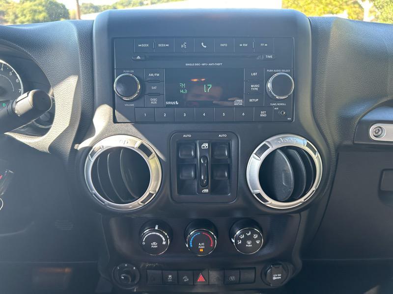 used 2015 Jeep Wrangler Unlimited car, priced at $16,995