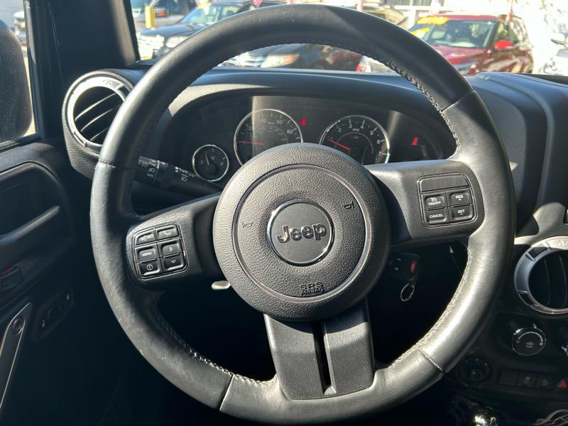 used 2015 Jeep Wrangler Unlimited car, priced at $16,995