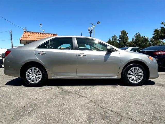 used 2014 Toyota Camry car, priced at $12,995