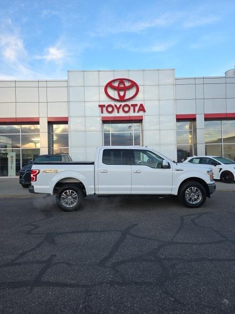 used 2018 Ford F-150 car, priced at $26,201