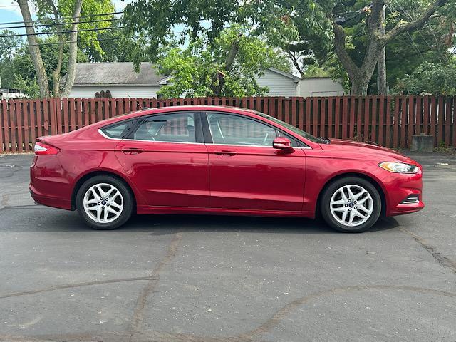used 2015 Ford Fusion car, priced at $11,900