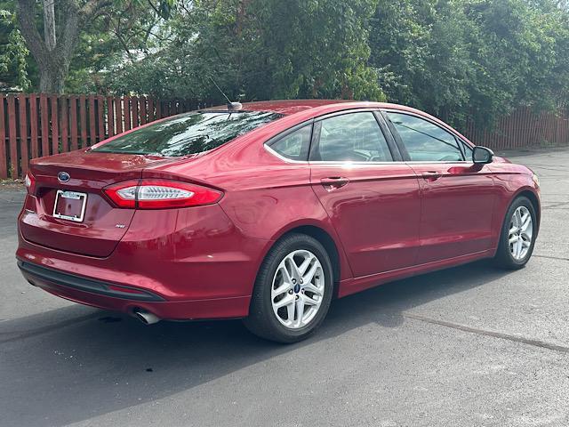 used 2015 Ford Fusion car, priced at $11,900
