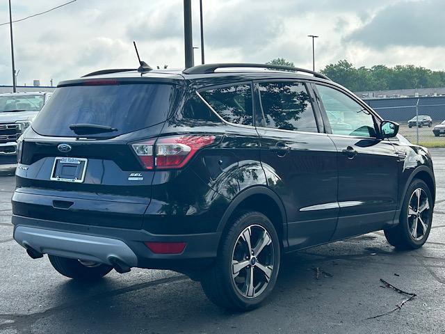 used 2018 Ford Escape car, priced at $12,900