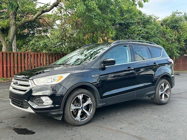 used 2018 Ford Escape car, priced at $12,900