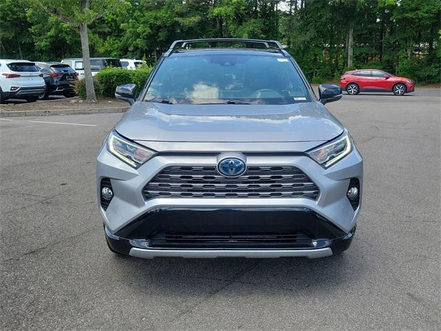 used 2021 Toyota RAV4 Hybrid car, priced at $26,400