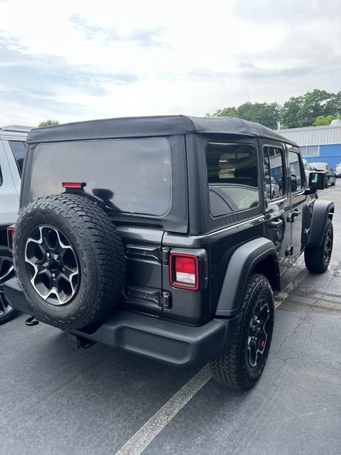 used 2021 Jeep Wrangler Unlimited car, priced at $33,097