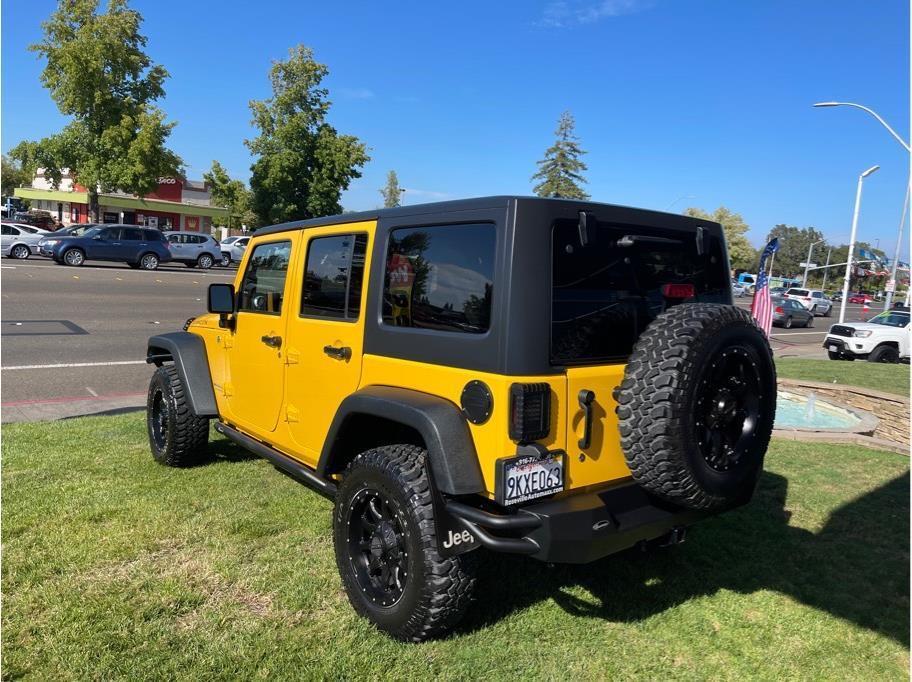 used 2015 Jeep Wrangler Unlimited car, priced at $32,546