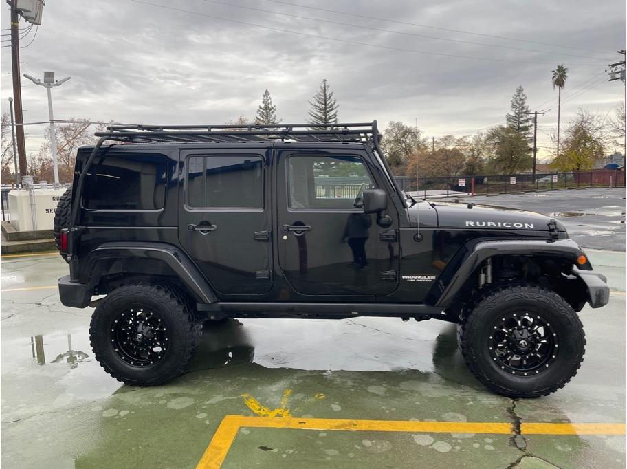 used 2012 Jeep Wrangler Unlimited car, priced at $22,988