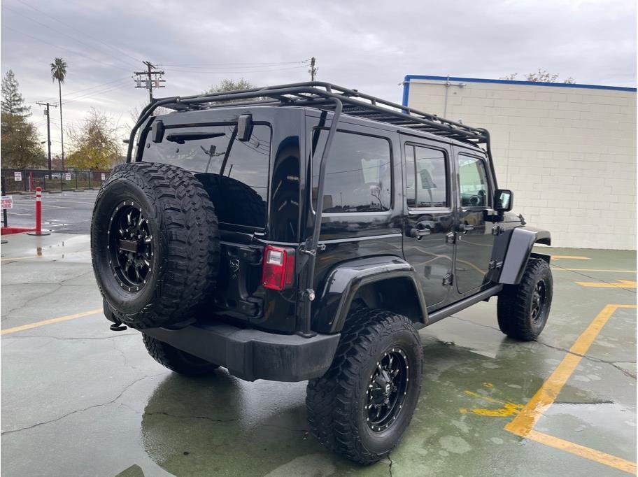 used 2012 Jeep Wrangler Unlimited car, priced at $22,988