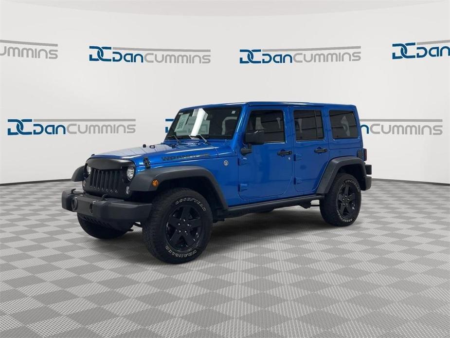 used 2016 Jeep Wrangler Unlimited car, priced at $19,587