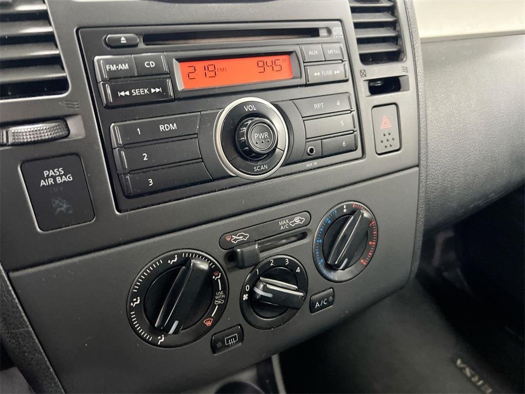 used 2010 Nissan Versa car, priced at $3,200