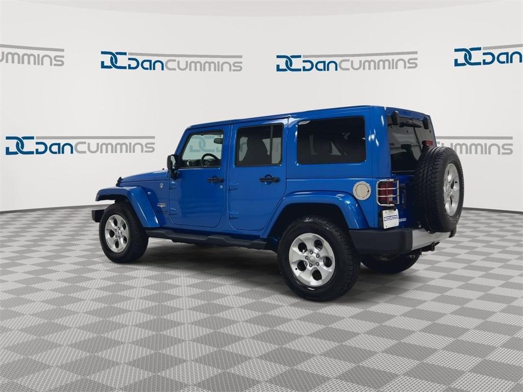 used 2015 Jeep Wrangler Unlimited car, priced at $22,587