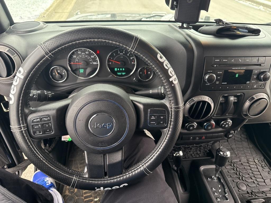 used 2015 Jeep Wrangler car, priced at $17,587