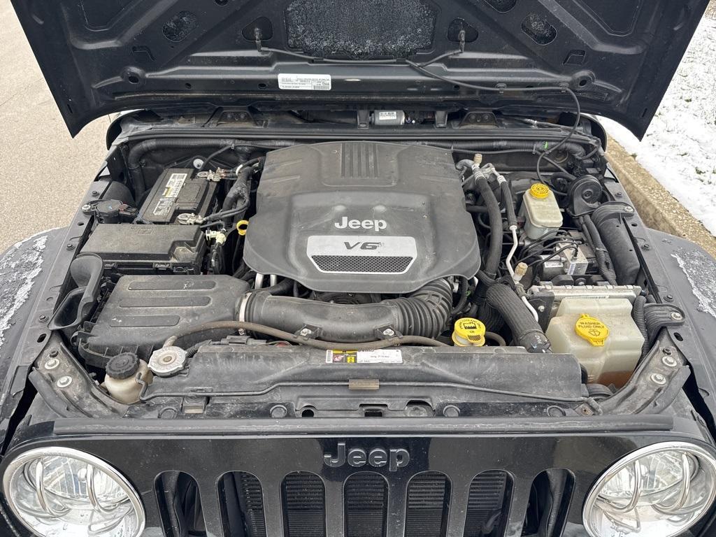 used 2015 Jeep Wrangler car, priced at $17,587