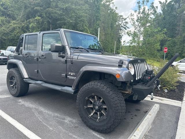 used 2016 Jeep Wrangler Unlimited car, priced at $22,518