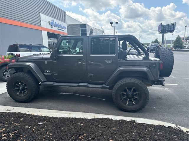 used 2016 Jeep Wrangler Unlimited car, priced at $22,518