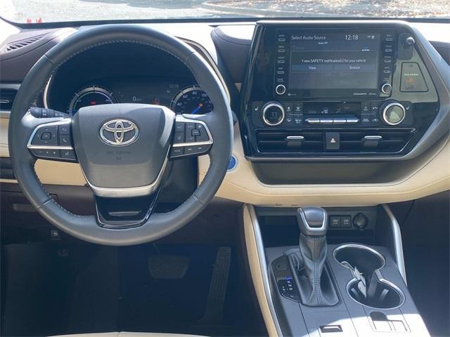 used 2021 Toyota Highlander Hybrid car, priced at $31,086