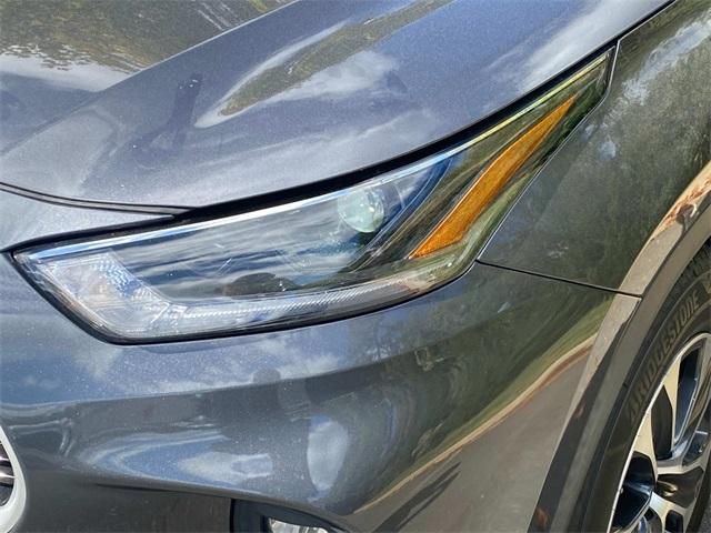 used 2021 Toyota Highlander Hybrid car, priced at $31,086