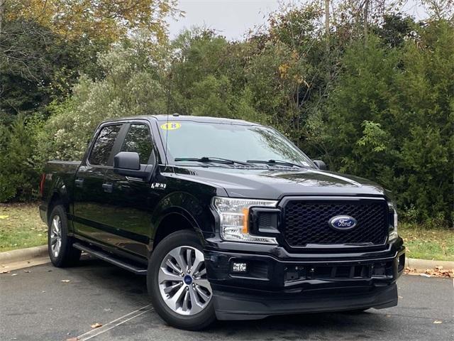 used 2018 Ford F-150 car, priced at $23,128