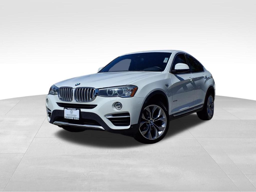 used 2018 BMW X4 car, priced at $19,672