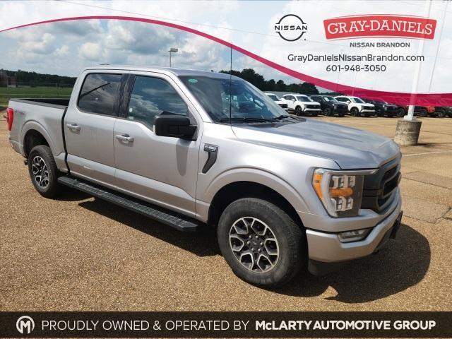 used 2023 Ford F-150 car, priced at $38,400