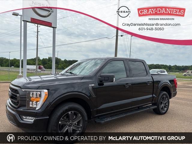 used 2023 Ford F-150 car, priced at $34,000