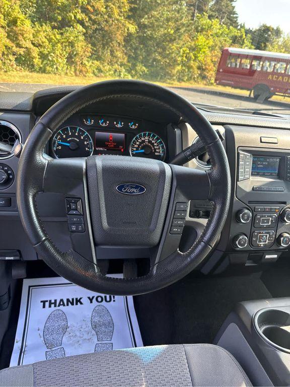 used 2014 Ford F-150 car, priced at $10,000