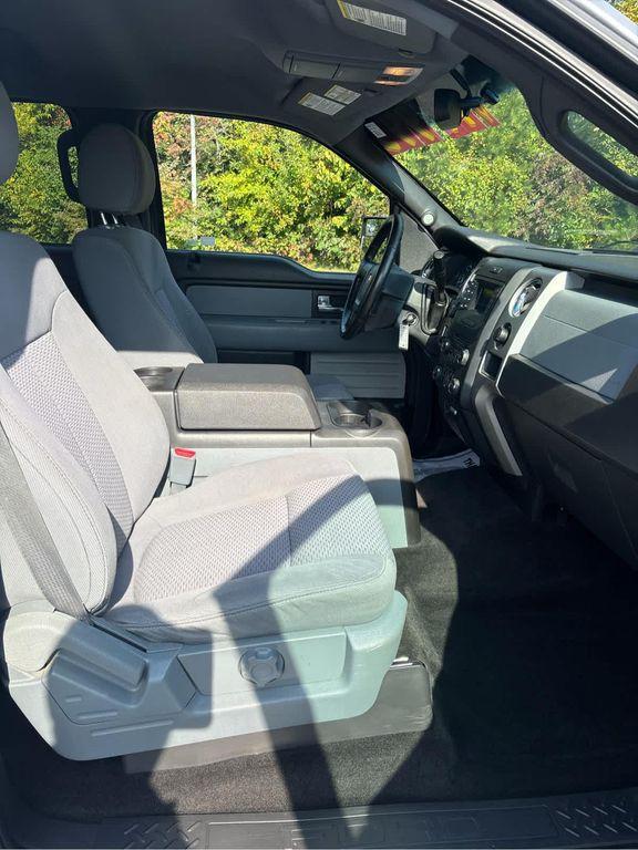 used 2014 Ford F-150 car, priced at $10,000