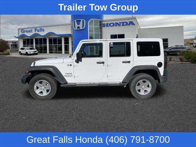 used 2013 Jeep Wrangler Unlimited car, priced at $18,978