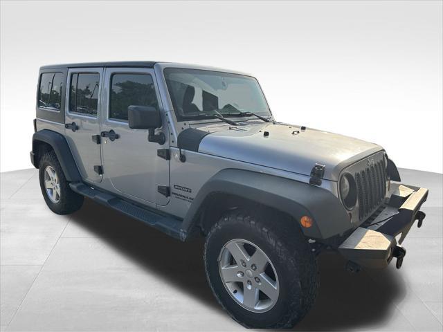 used 2013 Jeep Wrangler Unlimited car, priced at $16,900