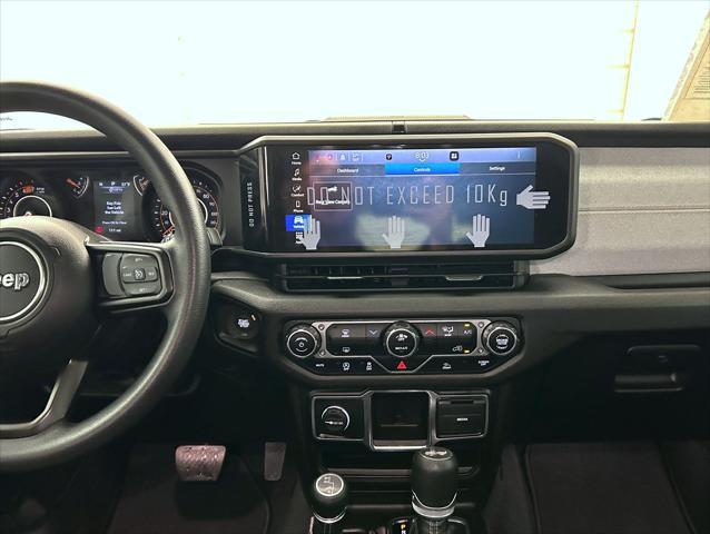 used 2024 Jeep Wrangler car, priced at $42,230