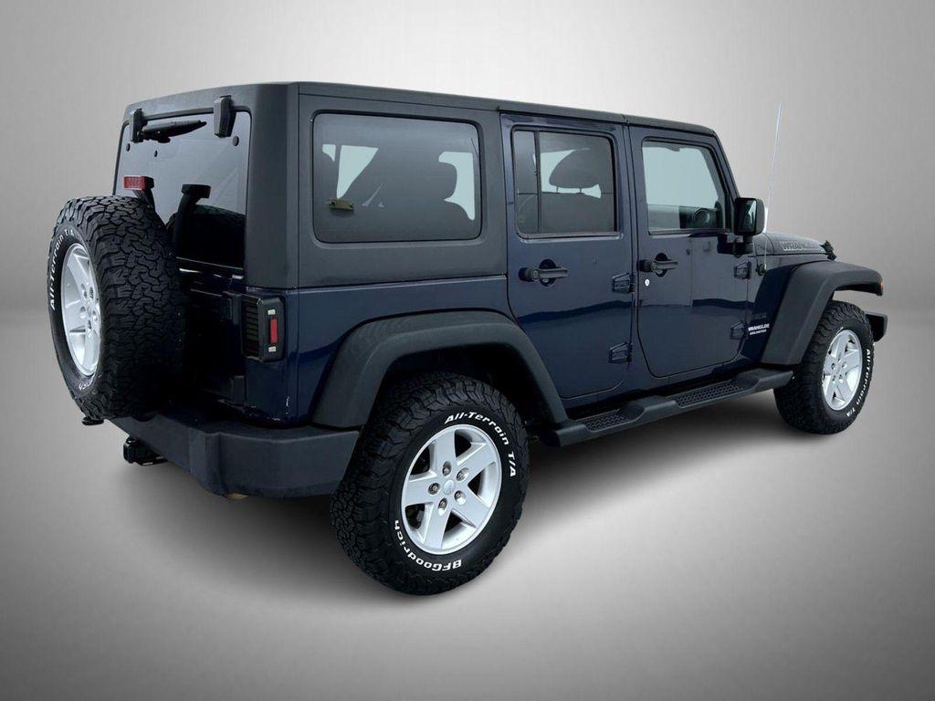 used 2013 Jeep Wrangler Unlimited car, priced at $14,583