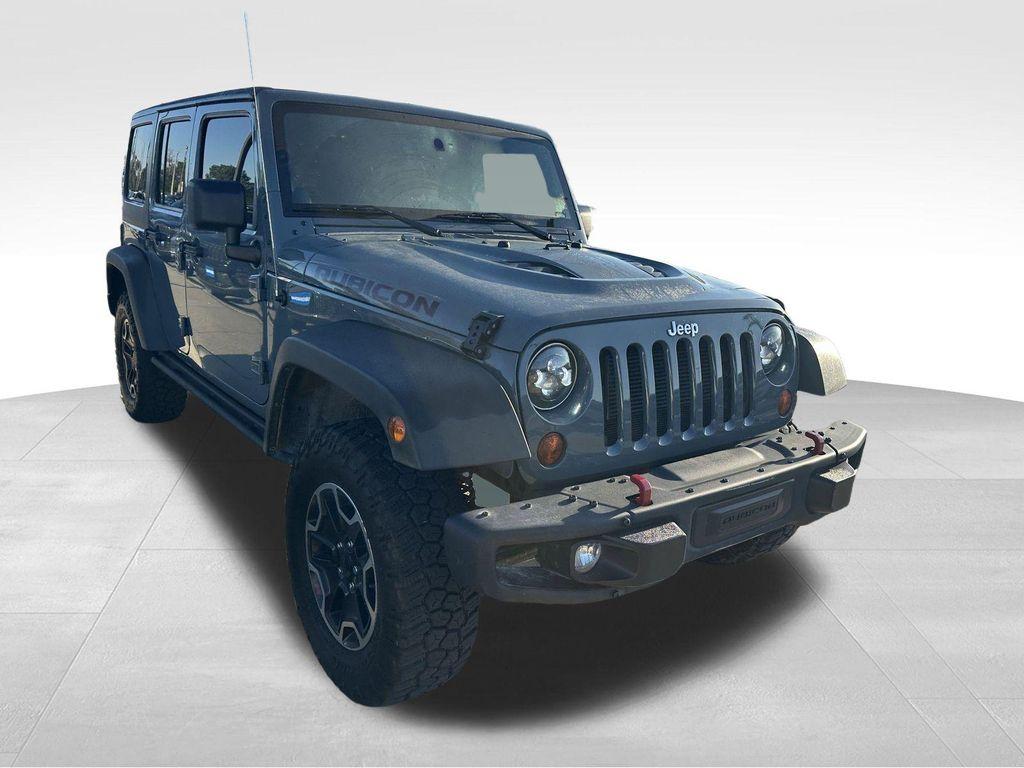 used 2013 Jeep Wrangler Unlimited car, priced at $21,069