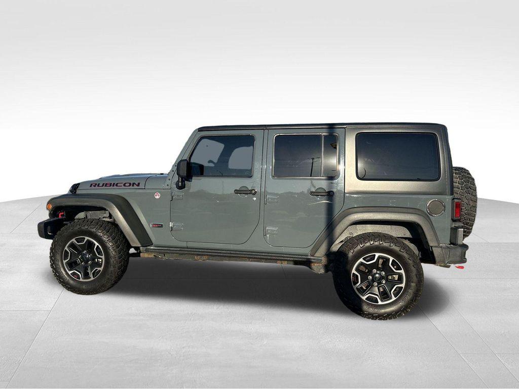 used 2013 Jeep Wrangler Unlimited car, priced at $21,069