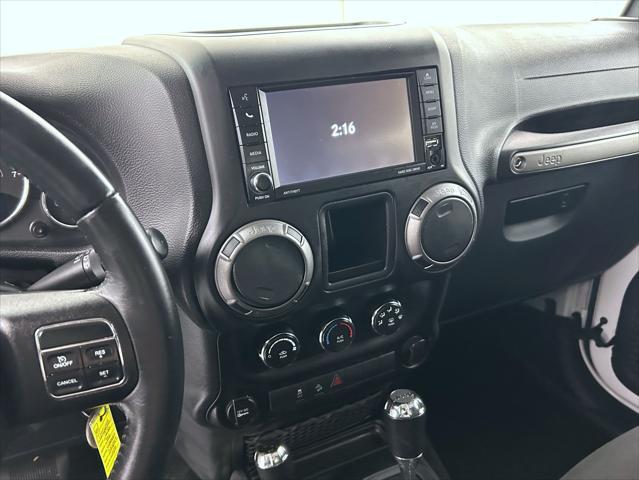 used 2016 Jeep Wrangler car, priced at $23,677