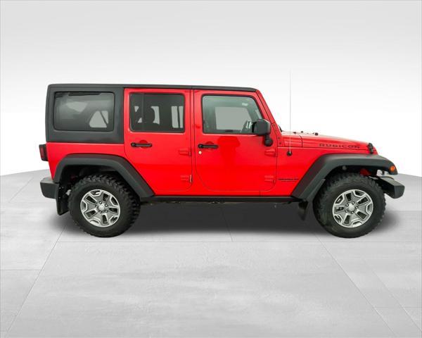 used 2016 Jeep Wrangler Unlimited car, priced at $26,303