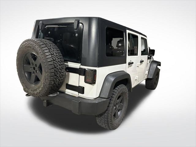 used 2010 Jeep Wrangler Unlimited car, priced at $13,540