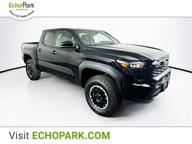 used 2025 Toyota Tacoma car, priced at $38,496
